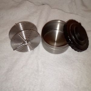 Film developing stainless steel tank with one stainless steel reel and PVC cap.